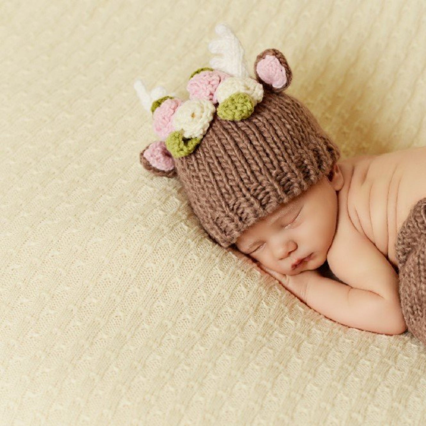 hand knit tan deer hat with pink ears and white antlers and flowers for baby infant toddler child christmas winter holiday