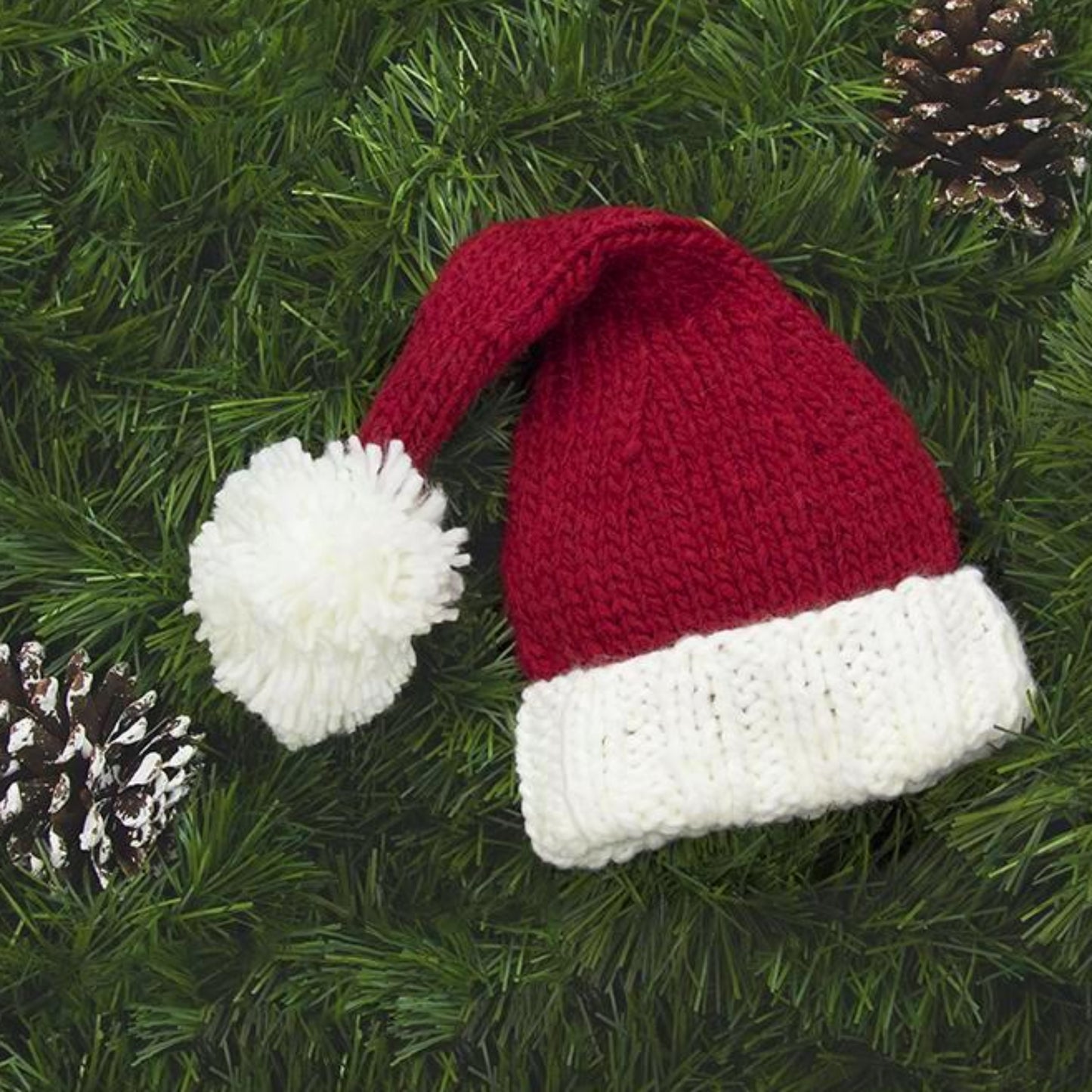 hand knit santa hat for baby and child in red and white